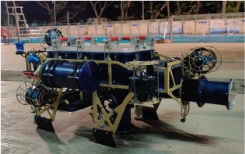 An autonomous underwater vehicle on a pool deck