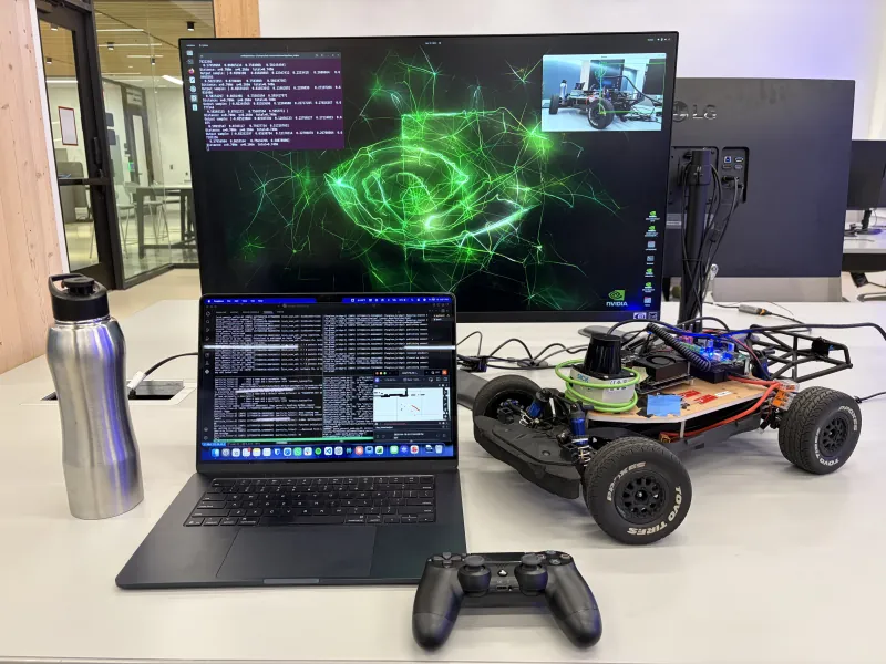 Laptop running ROS nodes next to the F1/10 car and a monitor showing the Jetson desktop